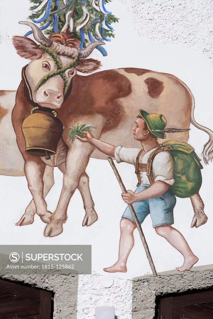 Germany, Bavaria, Wall painting of farm boy and cow