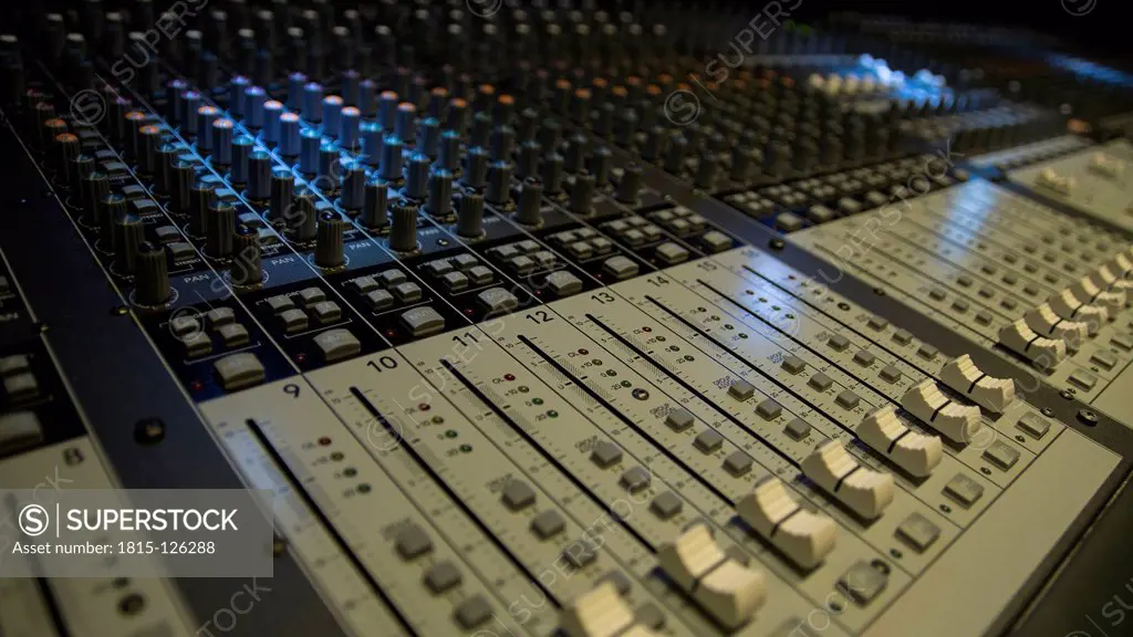 Germany, Munich, Controls and dials on audio mixer