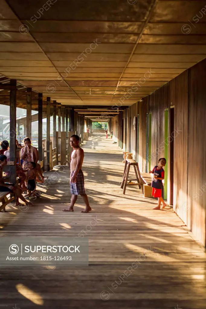 Malaysia, Sarawak, People in traditional longhouse