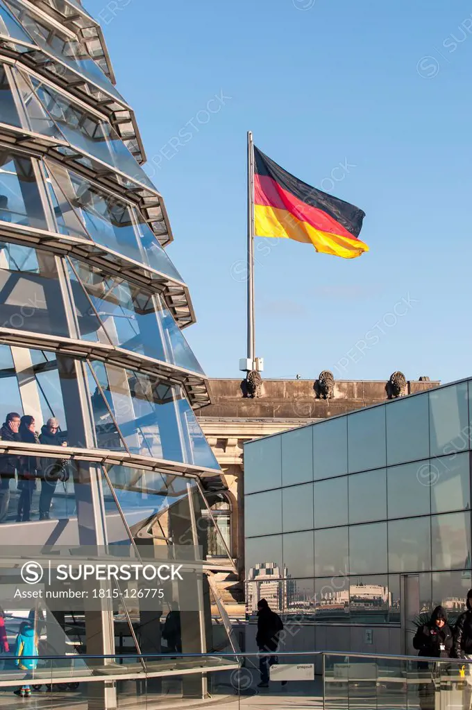 Germany, Berlin, Reichstag building with German flag