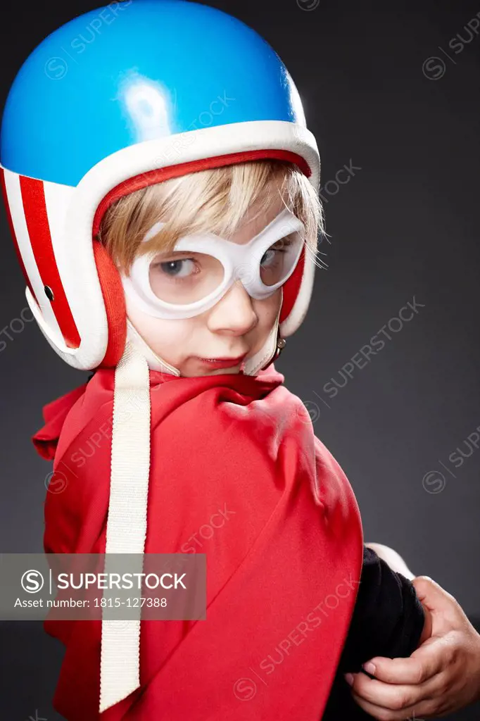 Portrait of boy with racer helmet, close up