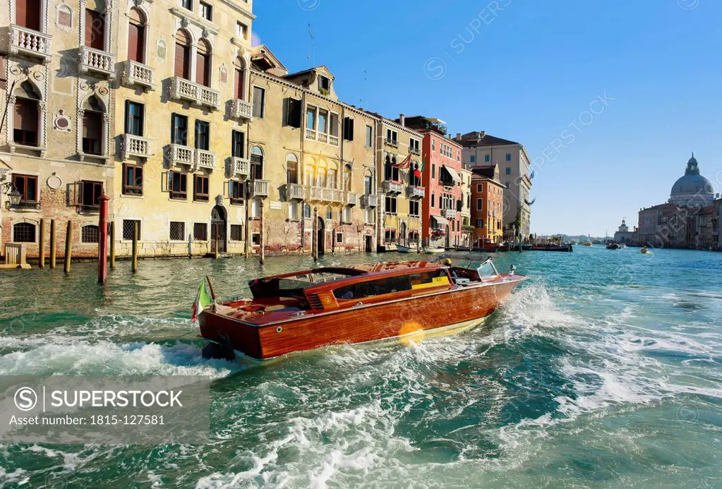 Italy, Venice, Morning traffic on Canal Grande at Santa Maria della Salute church