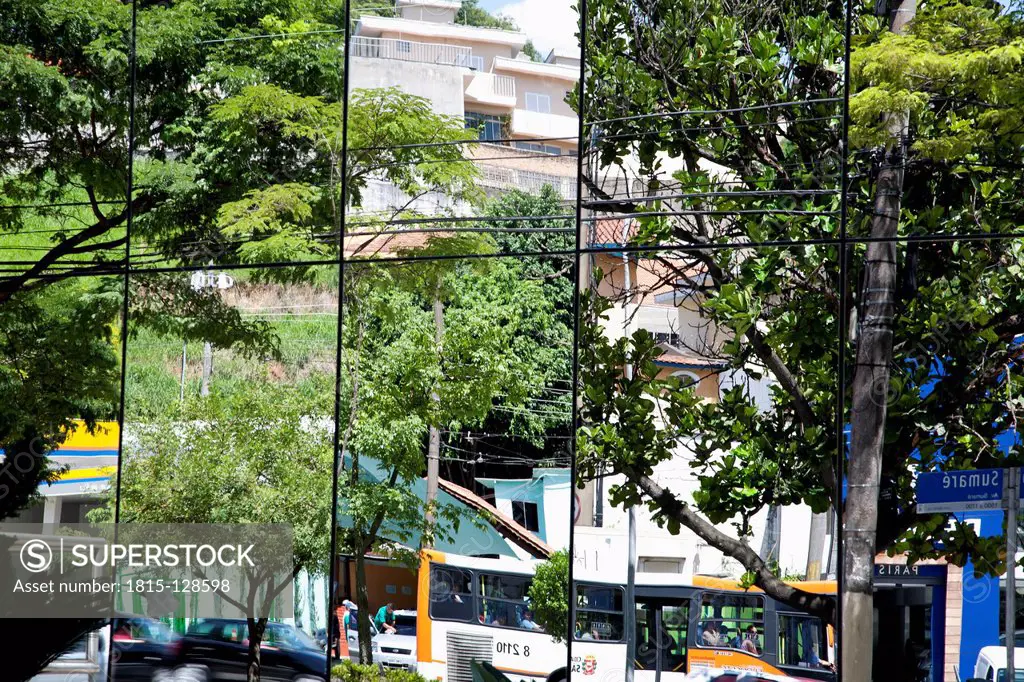 Brazil, Sao Paulo, City reflecting in mirror window
