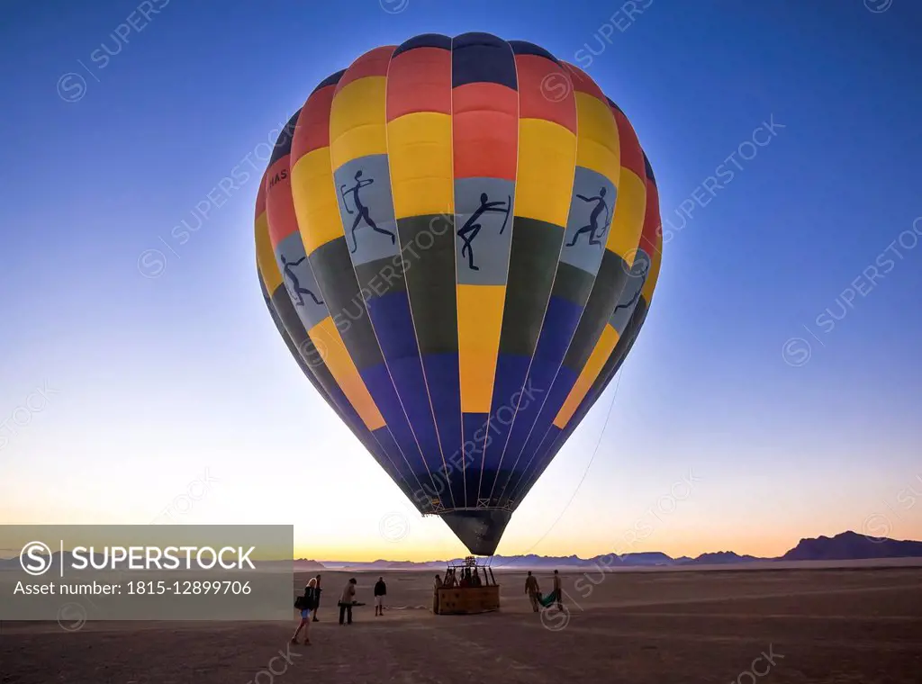 Namibia, Kuala Wilderness Reserve, People at air balloon at sunrise