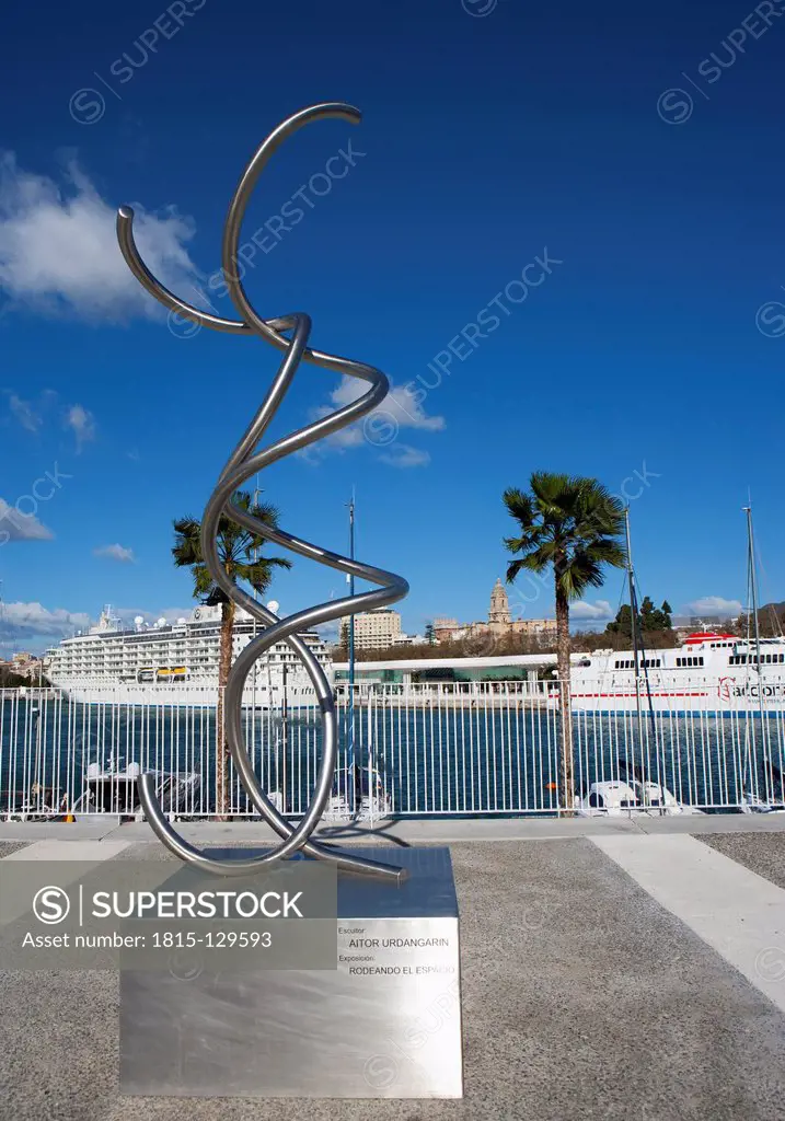 Spain, Malaga, View of cruise liner and sculpture at port