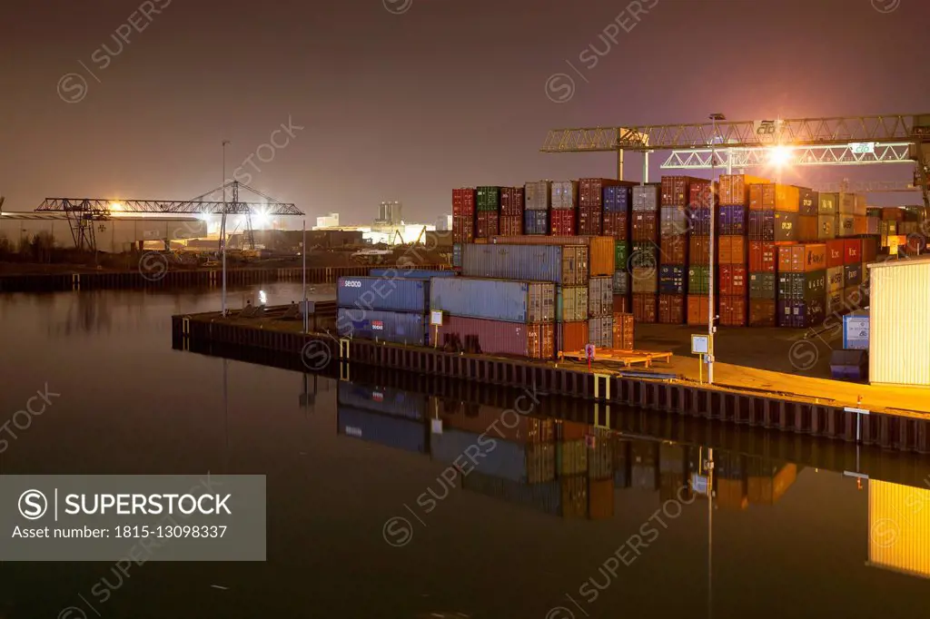 Germany, North Rhine-Westphalia, Dortmund, container at harbour in evening
