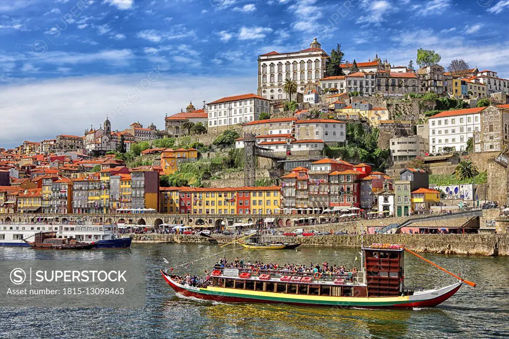 Portugal, Porto, River Duoro and city with barge