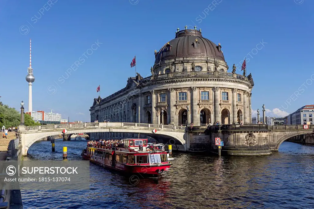 Germany, Berlin, View of tour boat at River Spree and Bode museum