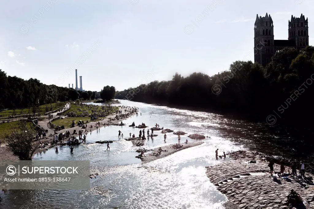 Germany, Bavaria, Munich, People enjoying sunshine at River Isar