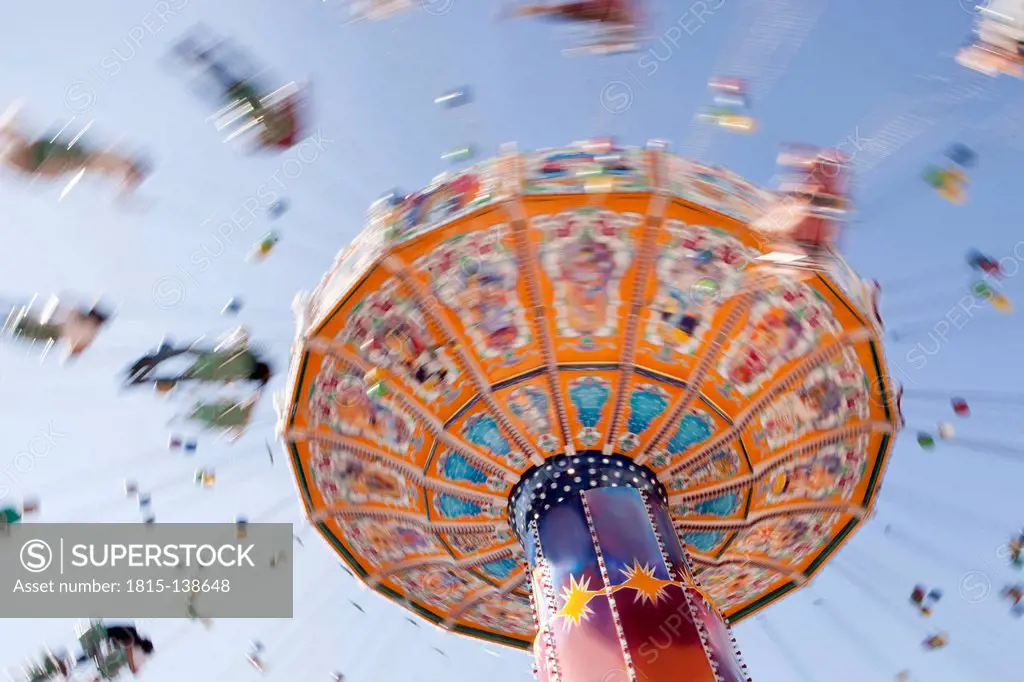 Germany, Bavaria, Munich, Carousel spinning on Oktoberfest