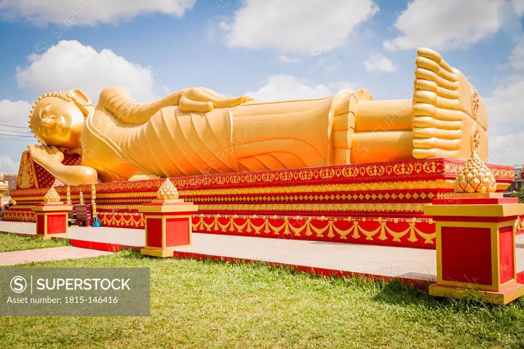 Loas, Vientiane, View of reclining golden buddha at Pha That Luang temple
