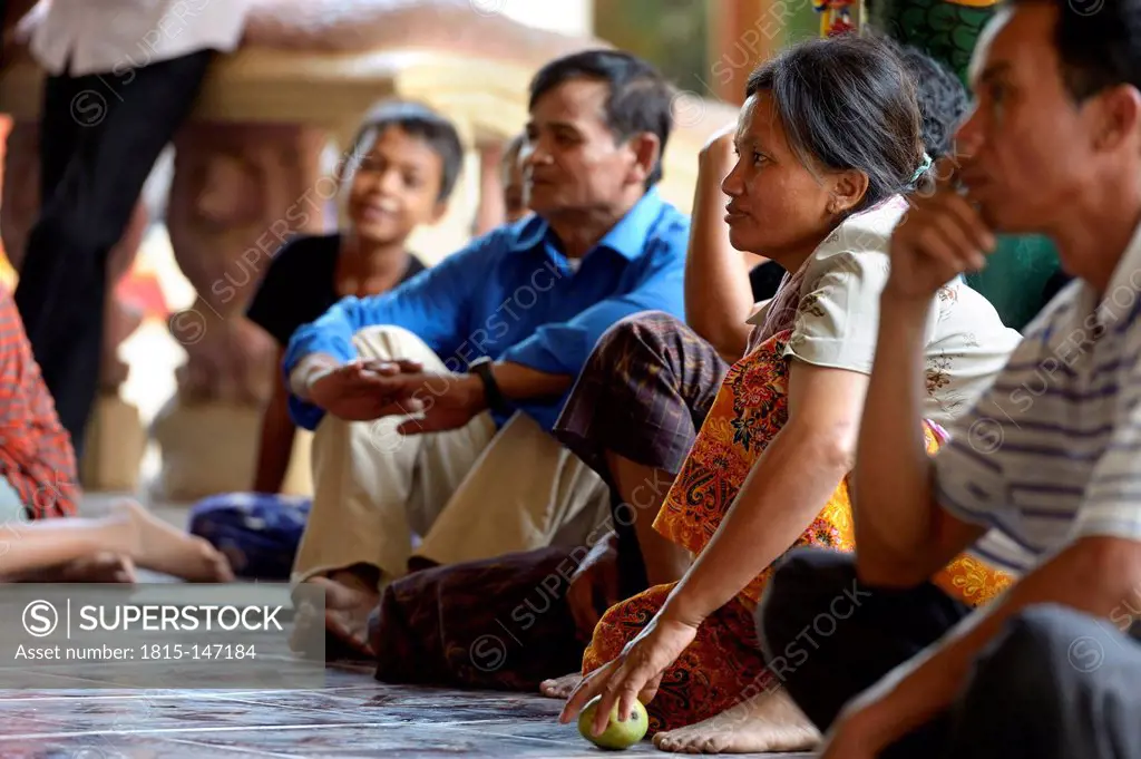 Cambodia, Takeo Province, Members of aid organisation discussing improvements of water supply with villagers