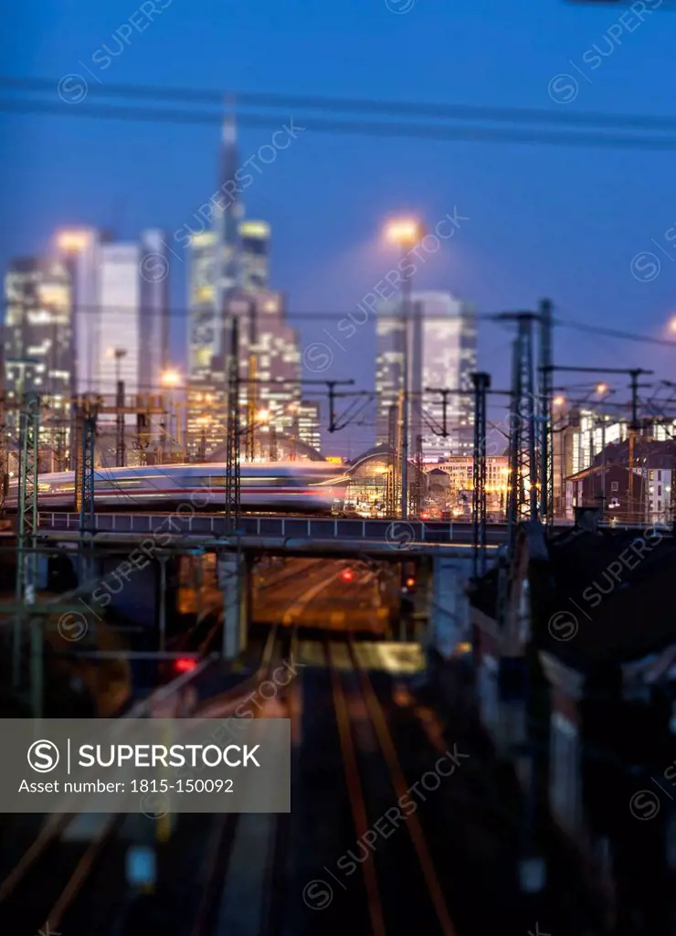 Germany, Hesse, Frankfurt, Tilt-shift view of central station with financial district in background