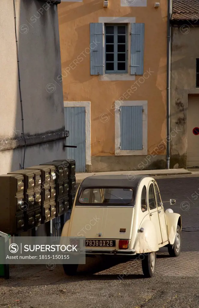 France, Drome, Suze-la-Rousse, Citroen 2CV in a typical french village