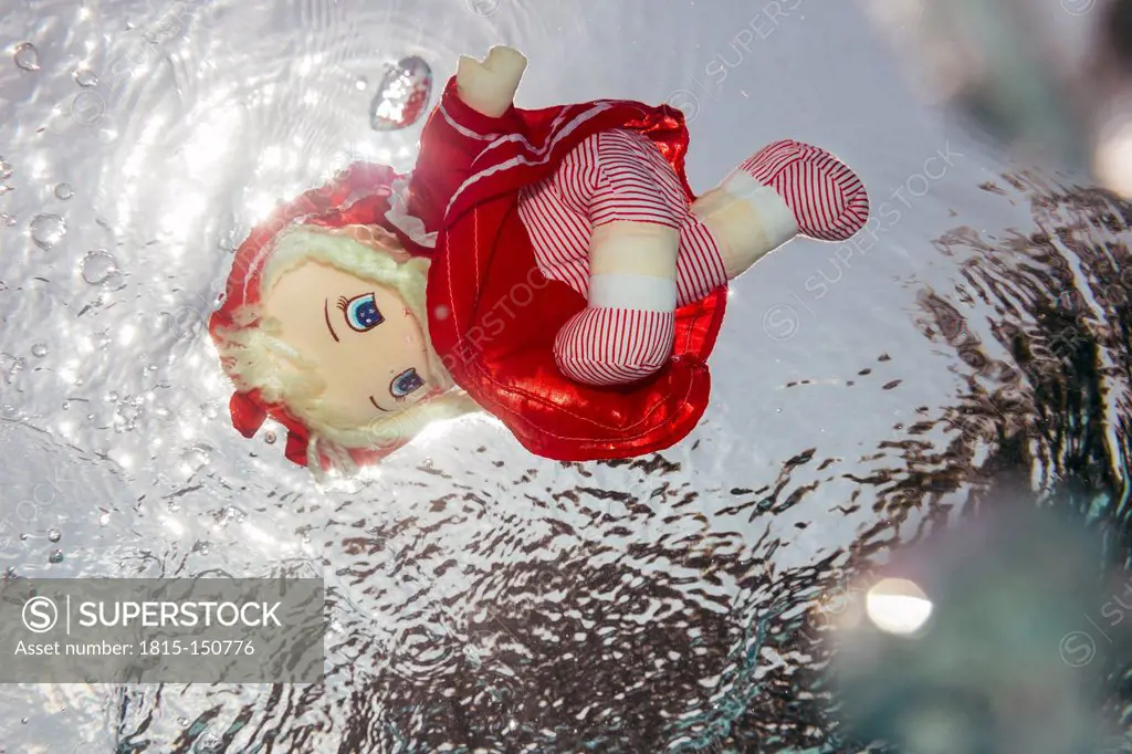 Doll under water