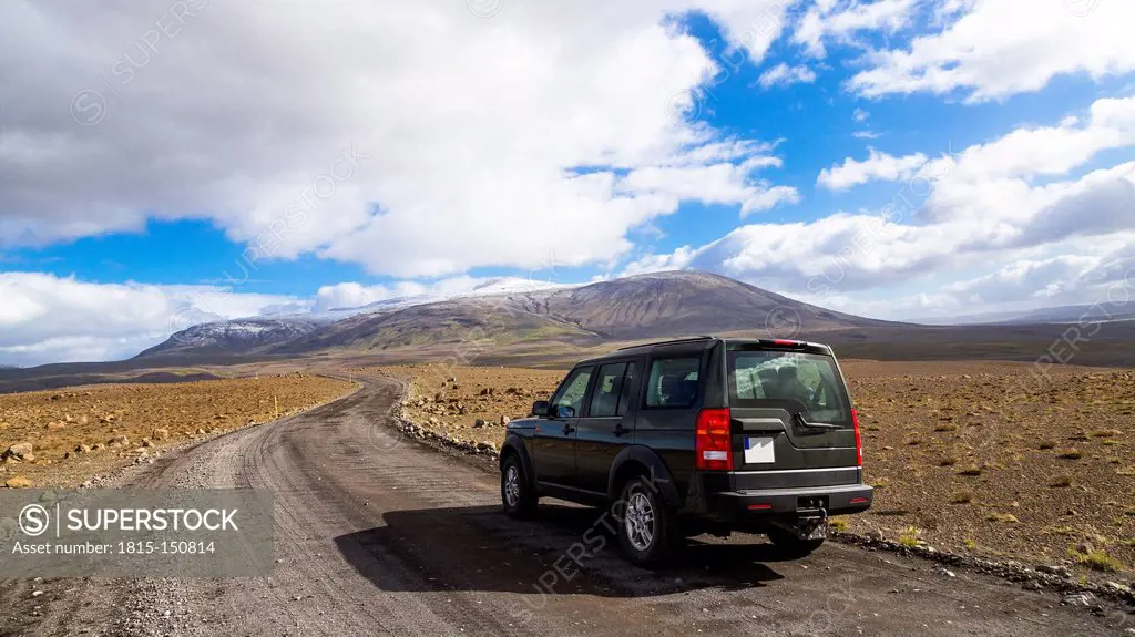 Iceland, Sudurland, Car on highland road
