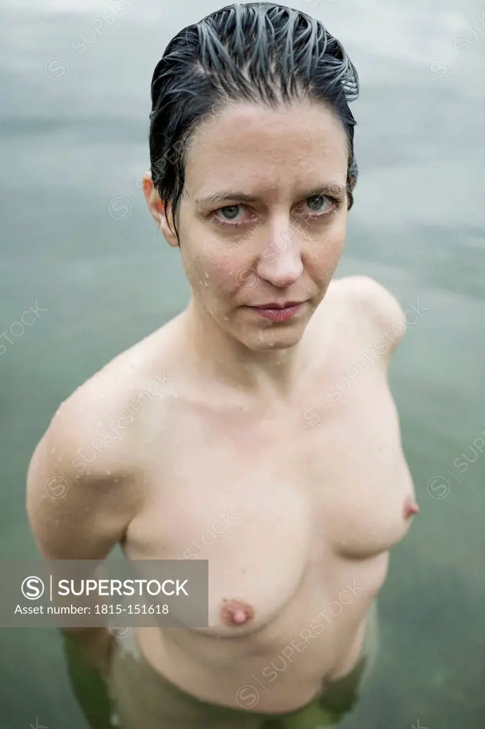 Germany, North Rhine-Westphalia, Cologne, Nude woman in a lake