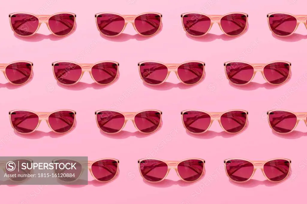 Pattern of rows of pink sunglasses
