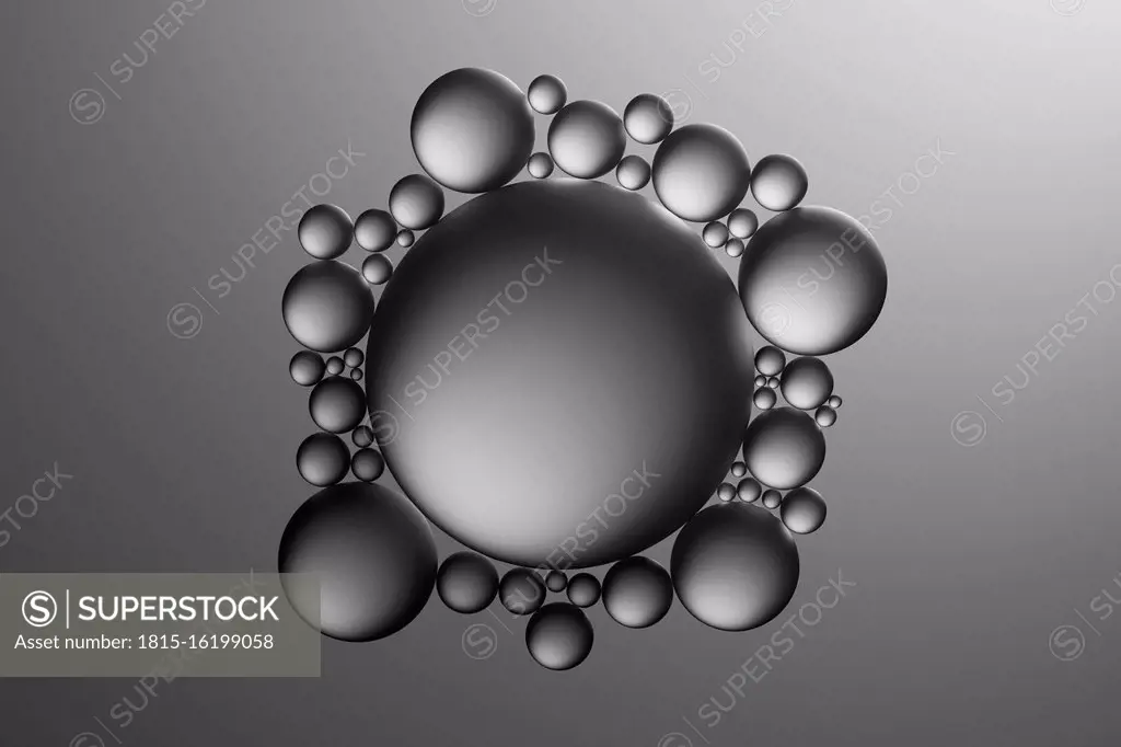Glass spheres and dramatic lighting over dark grey background, 3D Illustration