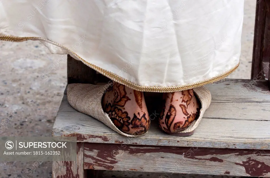 Morocco, Marrakesh-Tensift-El Haouz, Essaouira, feet of a woman painted with Henna