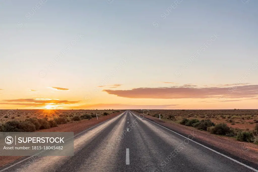 Australia, South Australia, Stuart Highway at sunset
