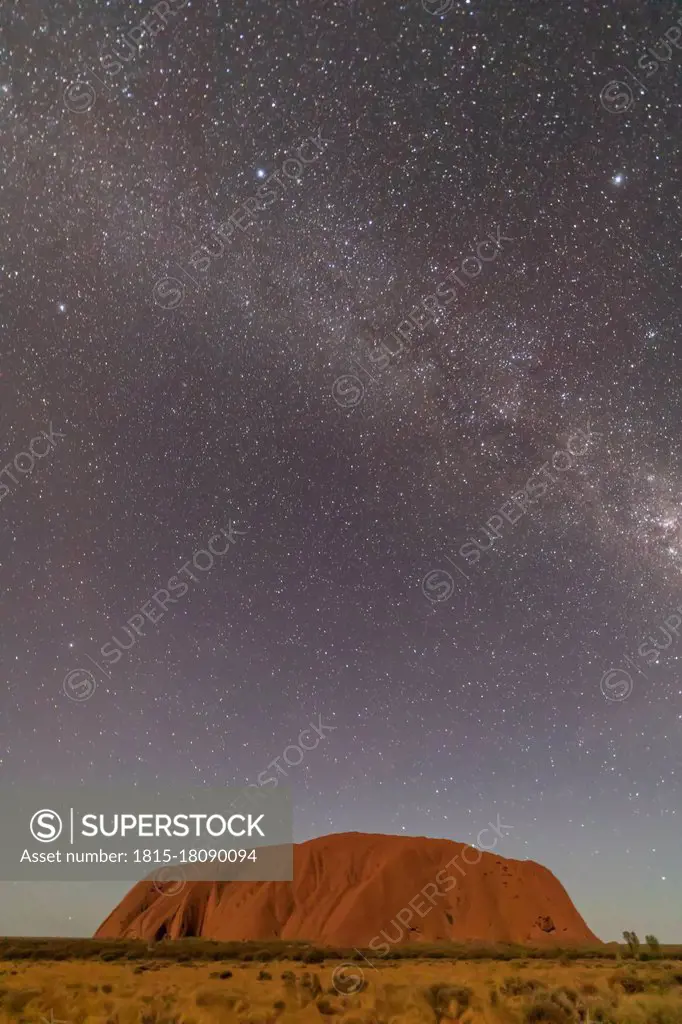 Australia, Northern Territory, Milky Way galaxy over Uluru (Ayers Rock) at dusk