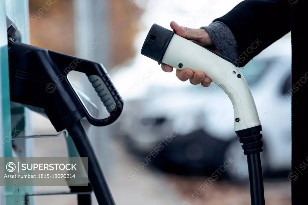 Woman holding fuel pump