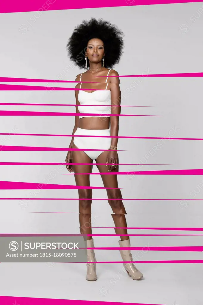 Afro woman in lingerie with pink stripes against white background