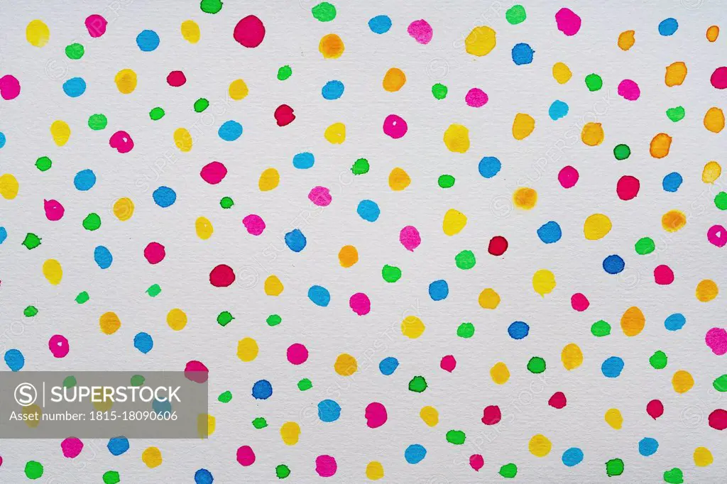 Colorful watercolor abstract dots pattern on white paper background