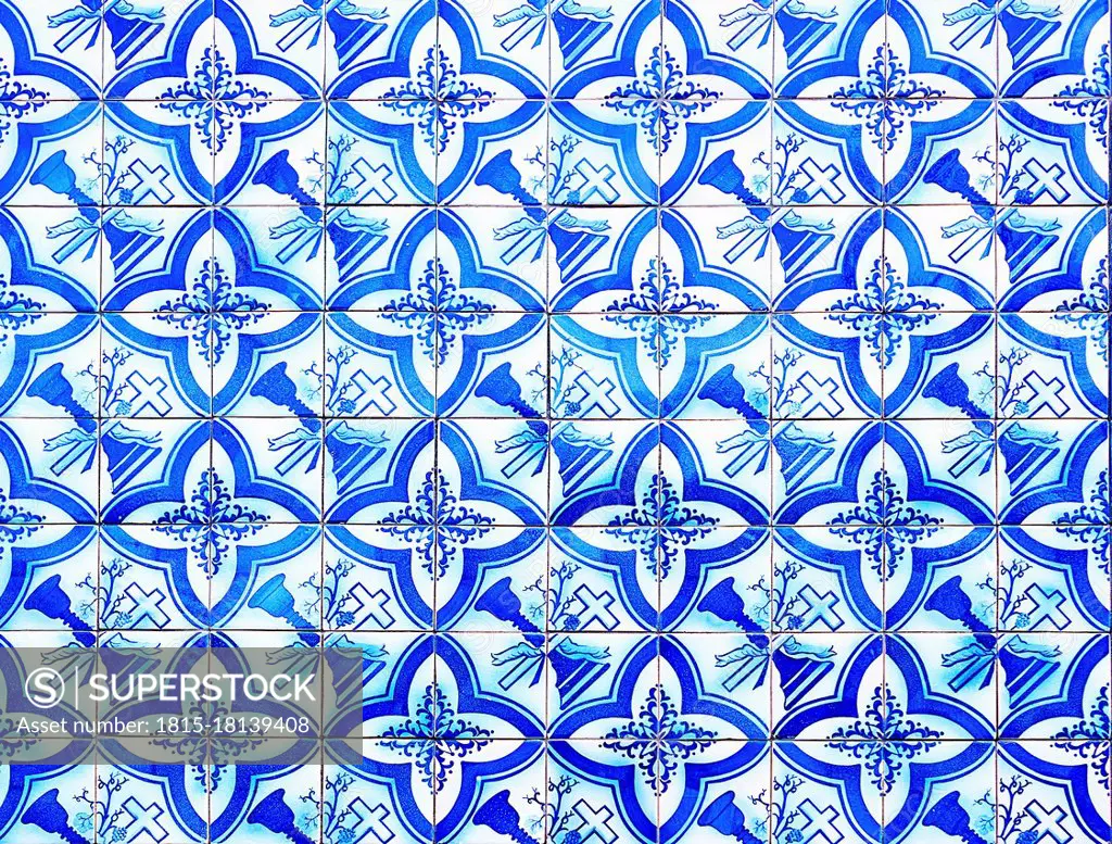 Full frame of blue colored mosaic wall with square tiles