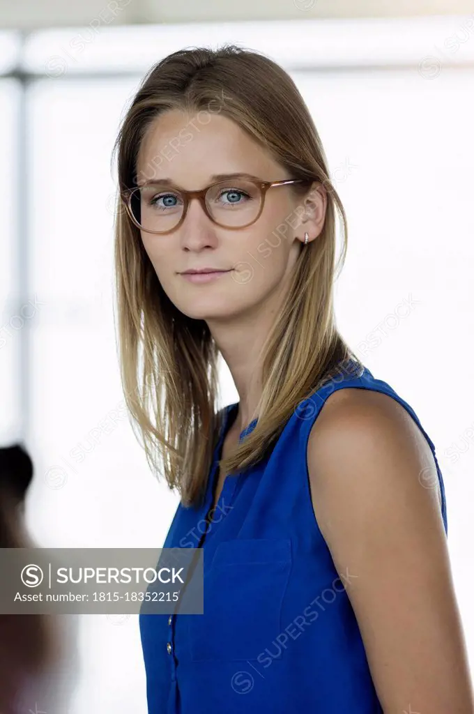 Female entrepreneur wearing eyeglasses in office