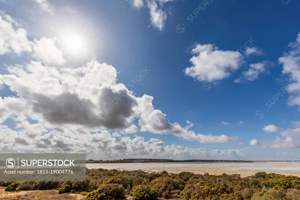 Australia, South Australia, Sun shining through clouds over Parnka Point beach