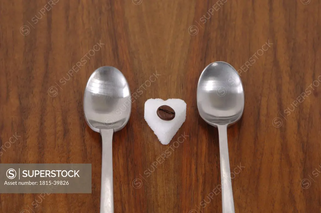 Sugar heart, coffe bean and spoons