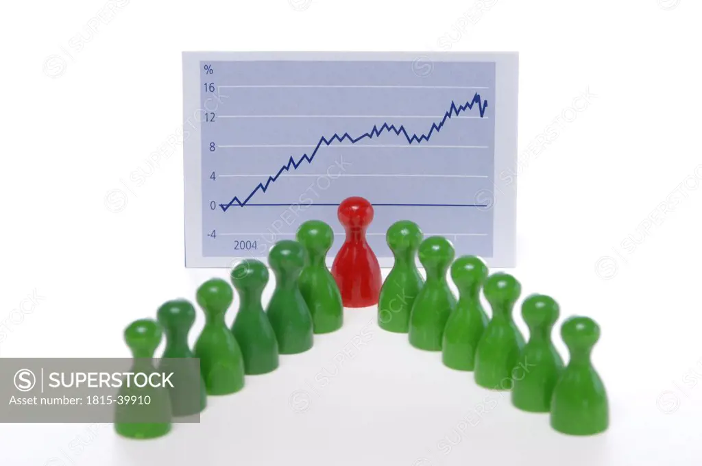 Game pieces in front of graph, close-up
