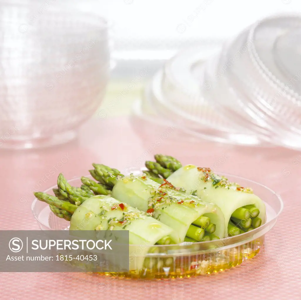 Green asparagus with cucumber, close-up