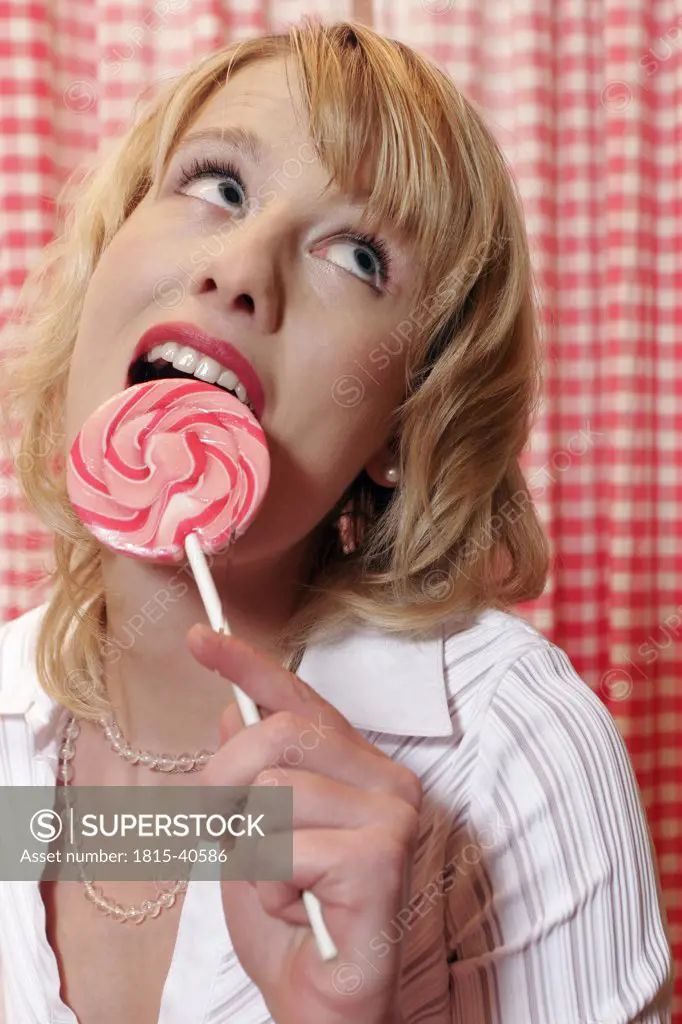 Young woman with lolly