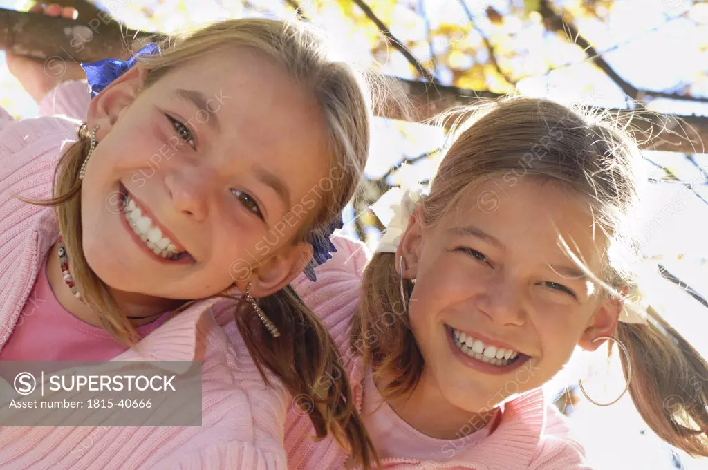 Two girls laughing, portrait