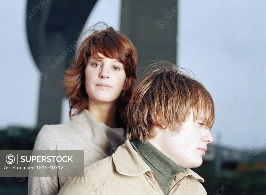 Young couple, portrait, outdoors