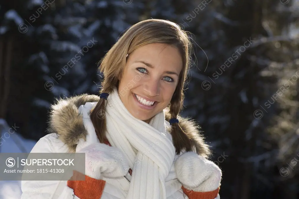 Austria, Altenmarkt, Young woman smiling, portrait