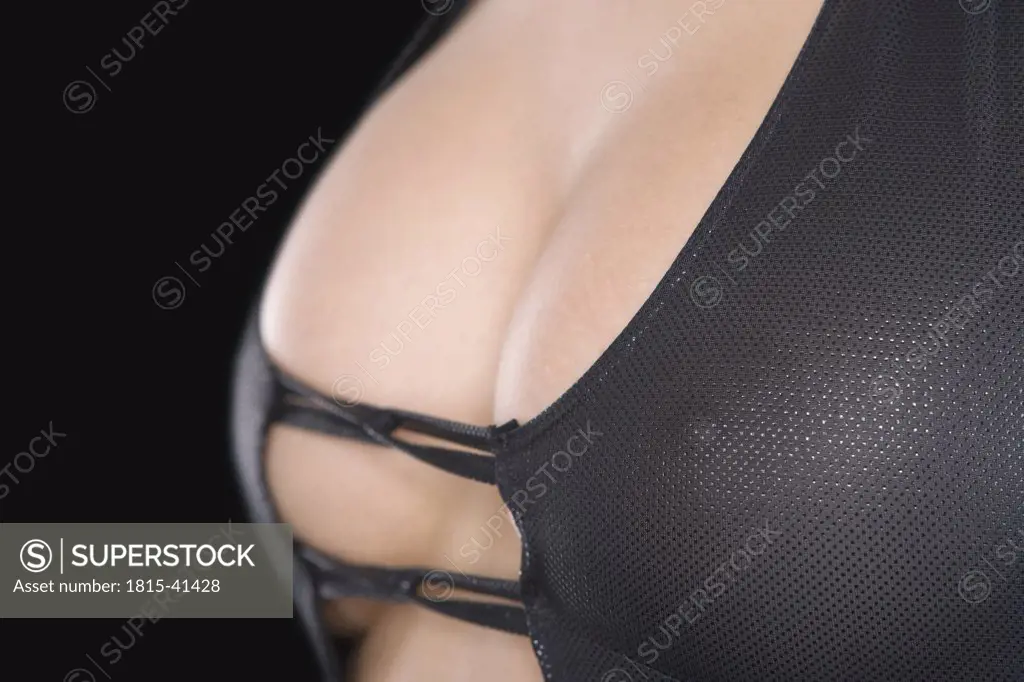 Woman wearing black corset, close-up