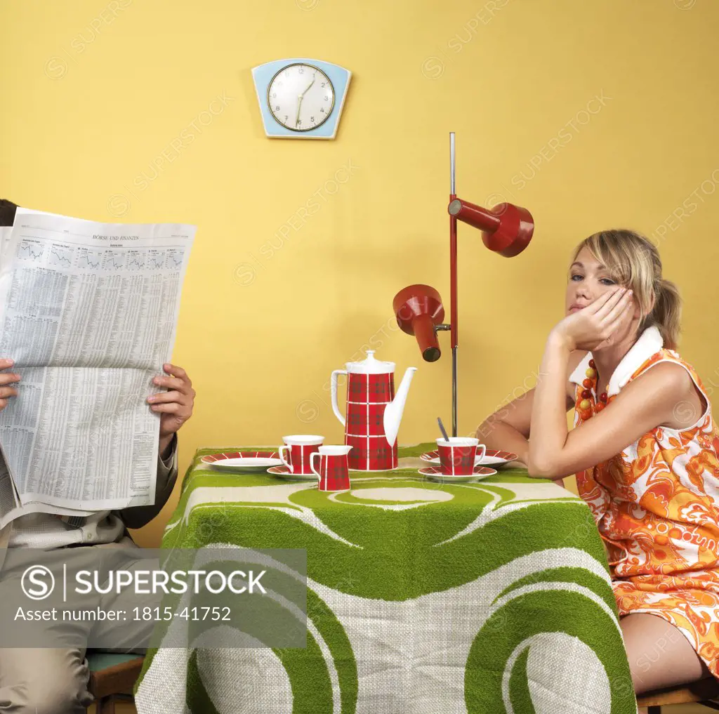 Man and woman at kitchen table