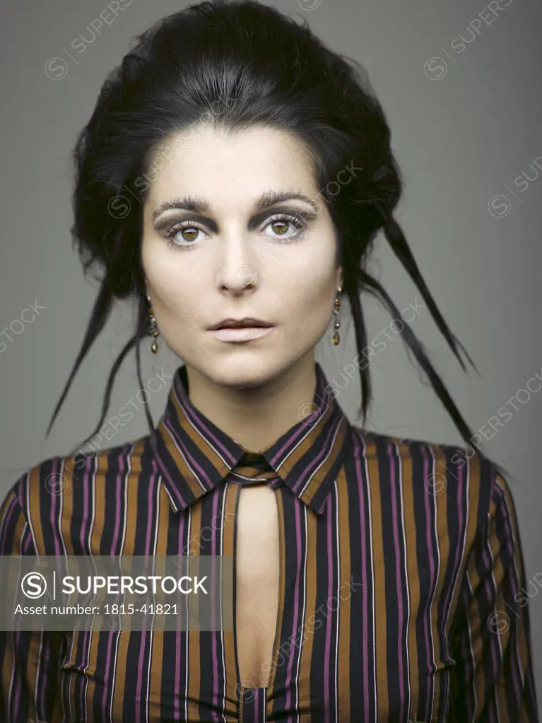 Woman with striped blouse, portrait