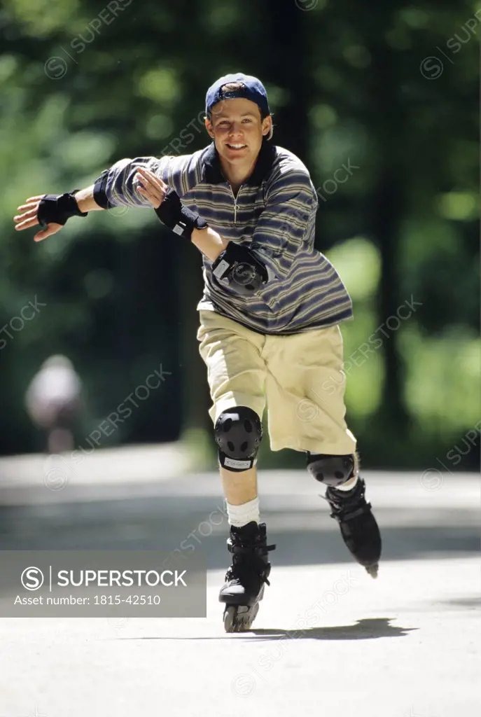Young man inline skating