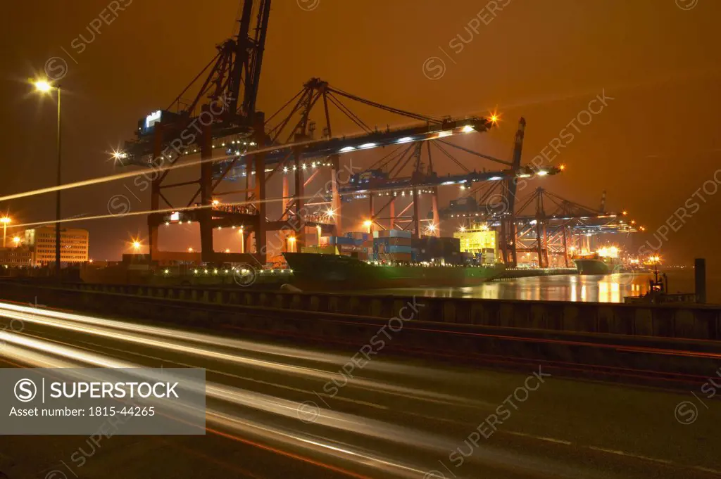 Germany, Hamburg, Container harbour at night