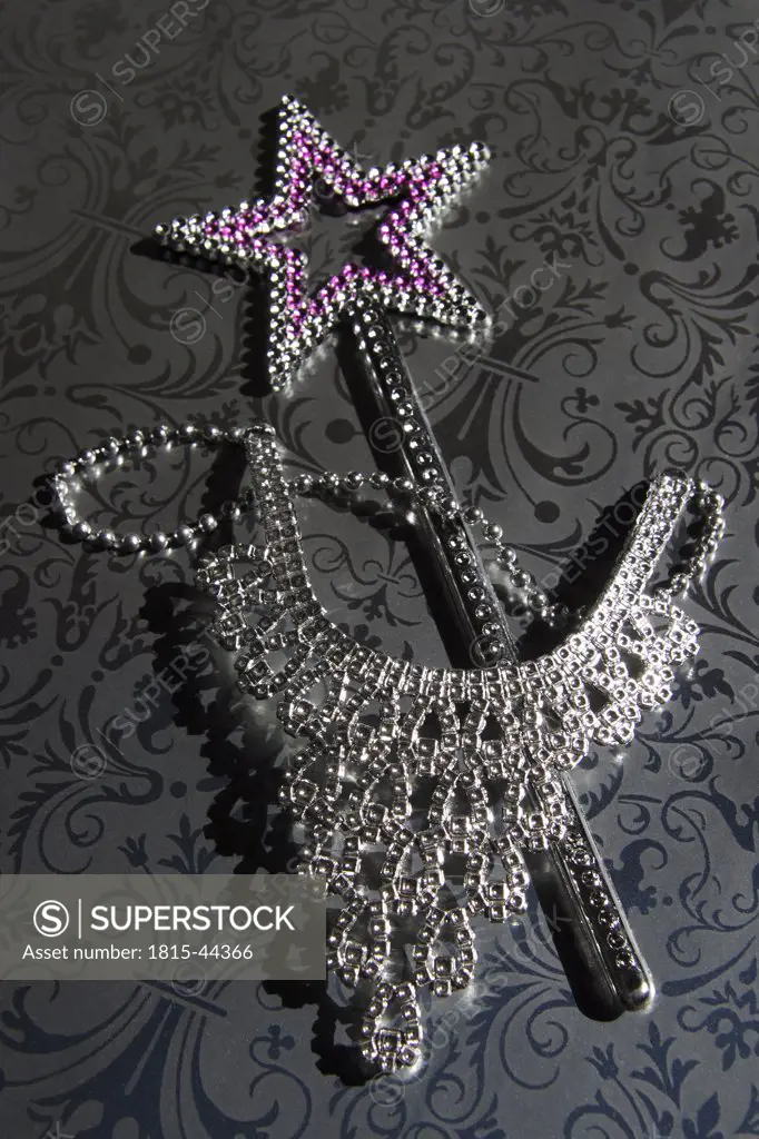 Star Shaped Wand and rhinestone necklace, close-up