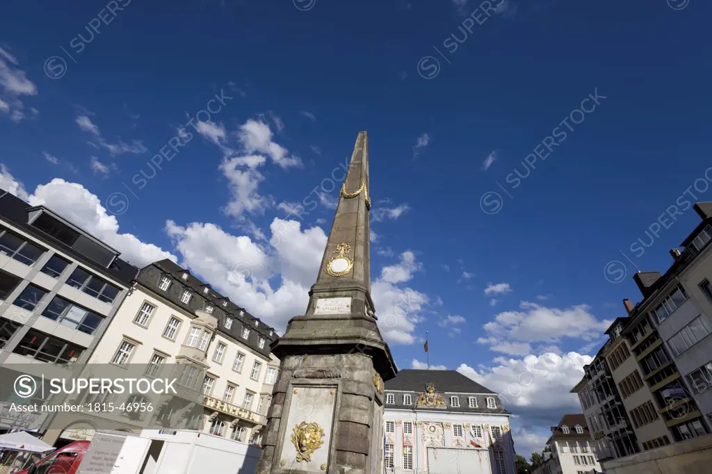 Germany, North Rhine-Westphalia, Bonn, Town Hall, Obelisk in foreground, low angle view