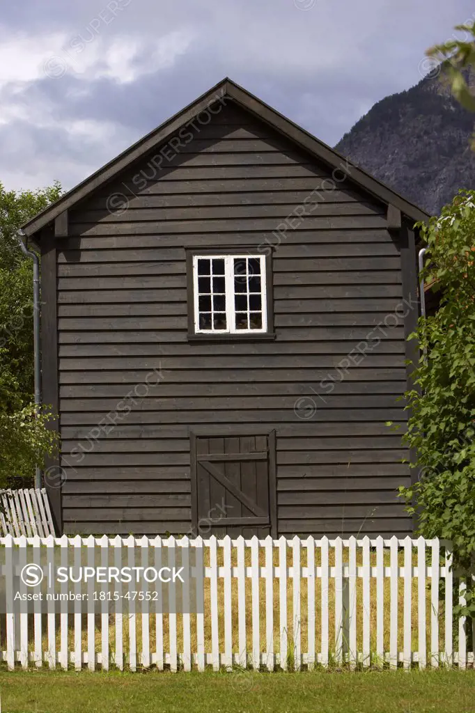 Norway, Laerdasory, Timber house, fence in foreground
