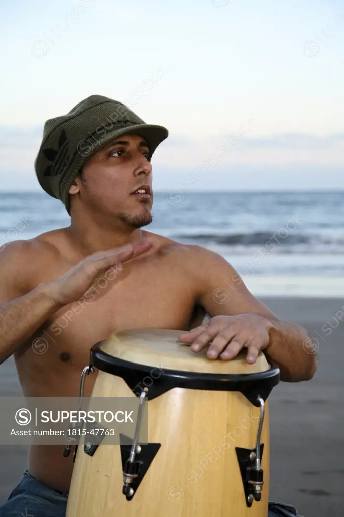 Spain, Canary Islands, Gran Canaria, Young man drumming