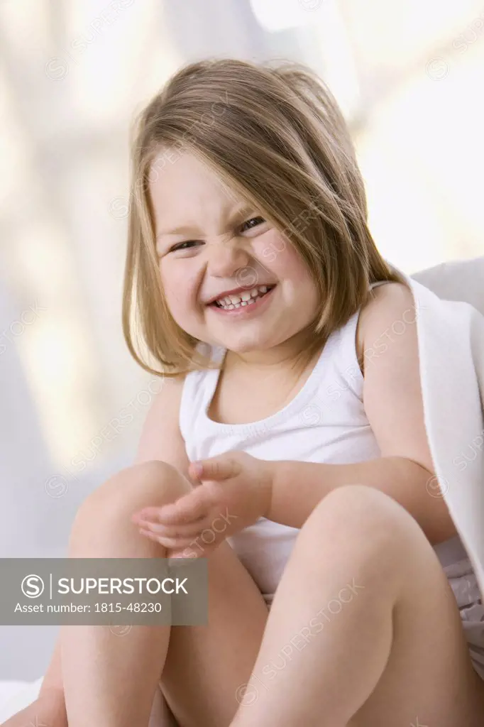 Little girl (3-4), smiling, portrait