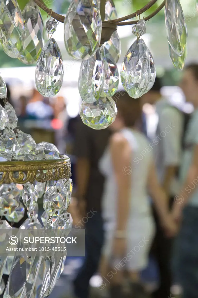 Germany, Baden-Württemberg, Stuttgart, Karlsplatz, Flea market, chandelier in foreground